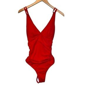 One piece women’s bathing suit, color is red, size is XL. Brand unknown